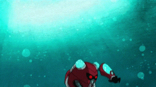 a red robot with red eyes is swimming in the ocean