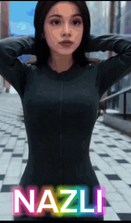 a woman in a black suit with the name nazli on it