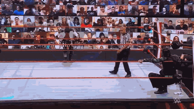 a wrestling ring with the w logo on the bottom
