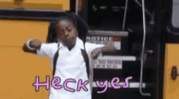 a girl standing in front of a school bus with the words heck yes written on the bottom