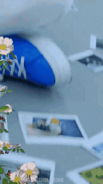 a blue pillow with the letters x on it