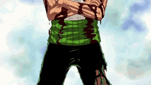 a man with a green shirt and black pants is standing with his arms crossed and blood coming out of his chest .