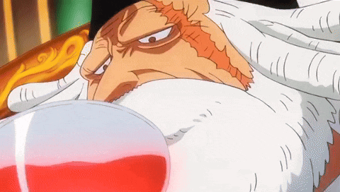 a cartoon of a man with a beard holding a glass of red liquid