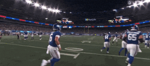 a football player with the number 6 on his jersey is running on the field