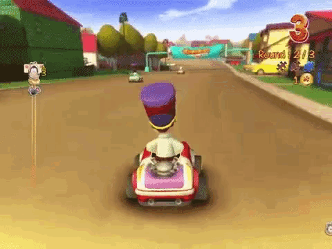 a cartoon character is driving a go kart in a video game with the number 3 on the bottom right