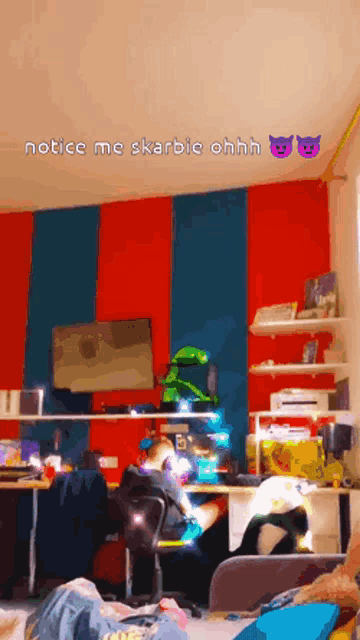 a room with a red and blue striped wall and the words notice me skarbie ohhh on the bottom