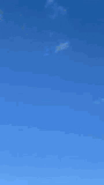 a blue sky with a few clouds in it