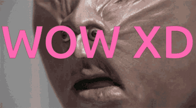 a close up of a face with the words wow xd written above it
