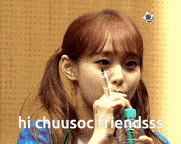 a girl drinking from a bottle with the words hi chuusoc friendsss written on the bottom