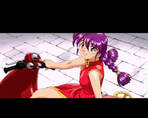 a girl in a red dress is riding a red scooter