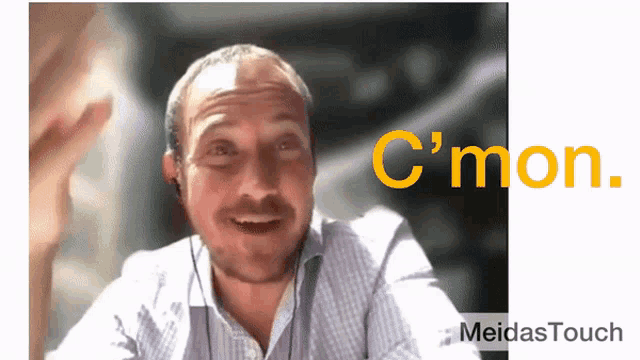 a man is smiling in front of a screen that says c'mon meidastouch