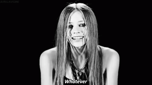 Avril Lavigne Whatever GIF - Avril Lavigne Whatever Shrug GIFs