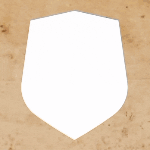 a green shield with a black border and a white center