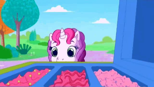 a cartoon of a unicorn peeking out of a blue box