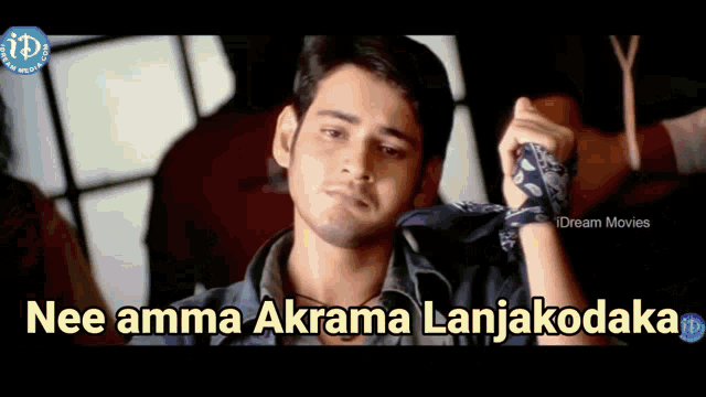 a man with a bandana around his wrist says " nee amma akrama lanjakodaka "