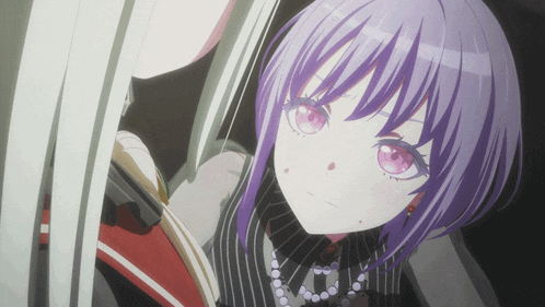 a girl with purple hair and pink eyes looks at another girl