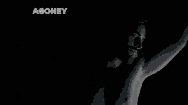 a black and white photo of a shirtless man with agoney written on the top