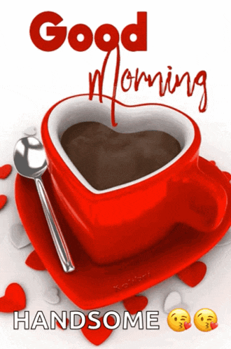 a red heart shaped cup of coffee with the words good morning handsome written on it