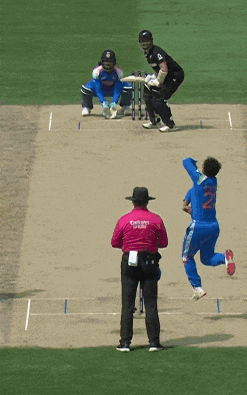a man wearing a pink shirt that says ' cricket world cup ' on it