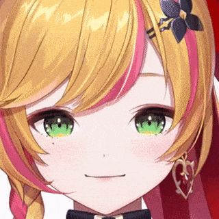 a close up of a girl with blonde hair and green eyes .