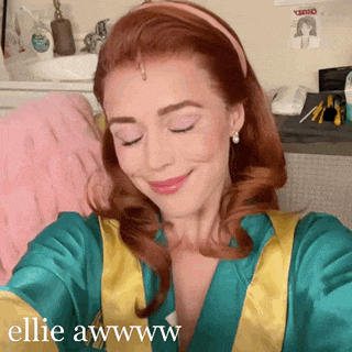 a woman taking a selfie with the words ellie awwww on the bottom