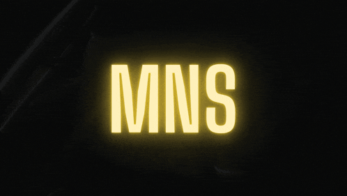 a logo for mns studio is glowing brightly in the dark