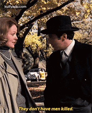 a man and a woman are standing next to each other and the man is saying they do n't have men killed .
