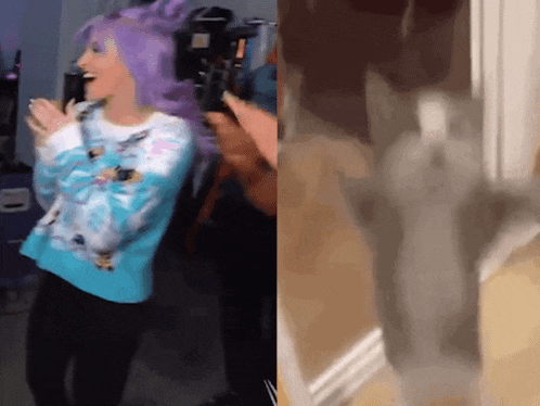 a woman with purple hair wearing a blue sweater is dancing