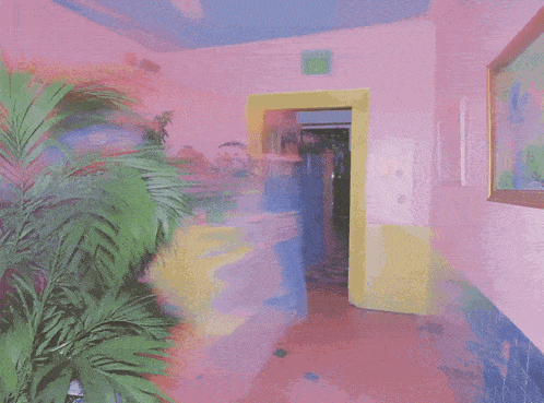 a pink and yellow hallway with a green exit sign on the ceiling