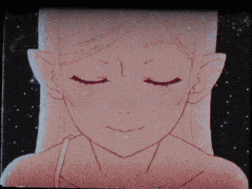 a close up of a girl 's face with tears coming out of her eyes