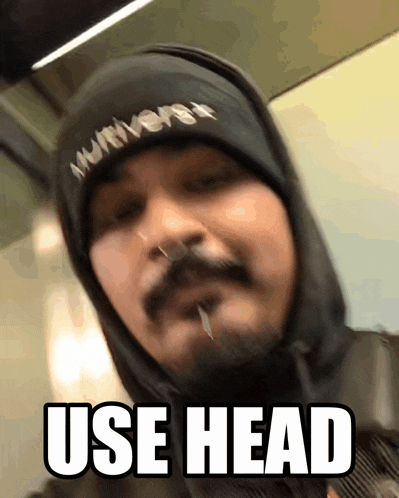 a man wearing a hat with the word multiverse on it says use head