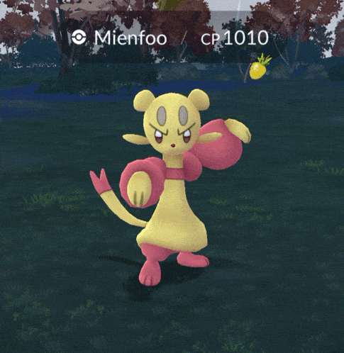 a pink and yellow cartoon character is kicking a ball in a field