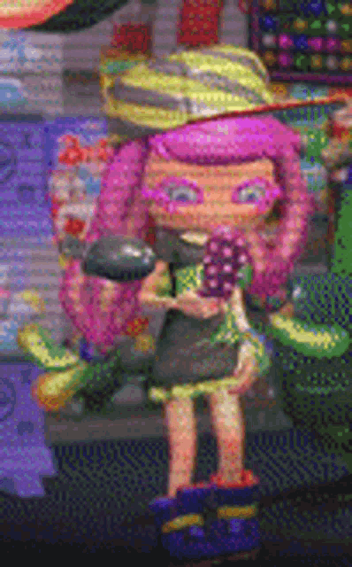 a doll with pink hair is holding a bunch of grapes in her hands .