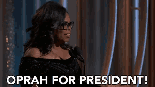 a woman speaking into a microphone with the words oprah for president below her