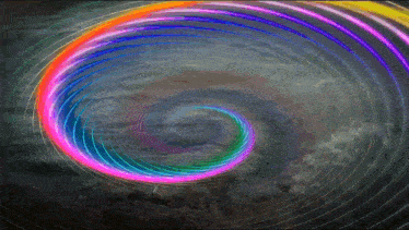 a rainbow colored swirl in the sky with clouds
