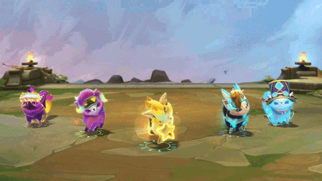 four colorful animals are standing in a row on a rocky field