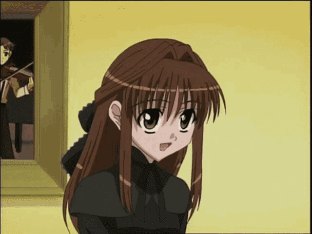 a girl in a black dress is standing in front of a man playing a violin
