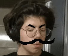 a young boy wearing glasses and headphones has a fake mustache on his face .