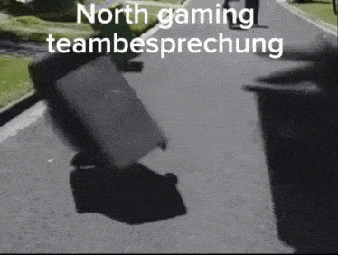 a person is throwing a trash can down a street with the words north gaming teambespeechung written on it