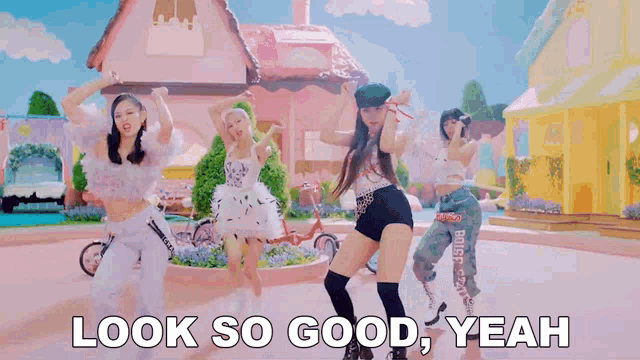 a woman is blowing a kiss in a video with the words `` look so good , yeah '' written on the bottom .