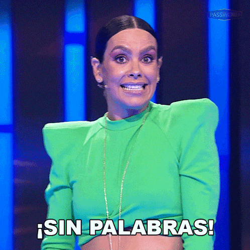 a woman in a green top says sin palabras in spanish