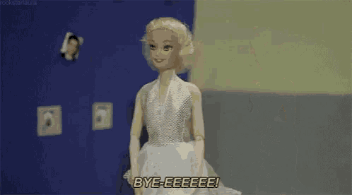 a barbie doll in a white dress says bye-eeeee
