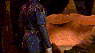 a woman in a blue and purple suit is standing in front of a wall .