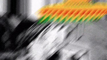 a black and white image with a yellow green and orange stripe