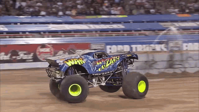a monster truck that says war wizard on it