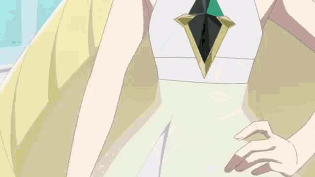 a person holding a diamond shaped object in their hand