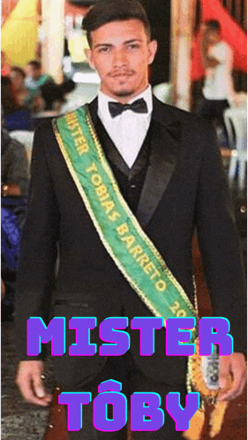 a man in a tuxedo has a sash that says mister tobias barreto