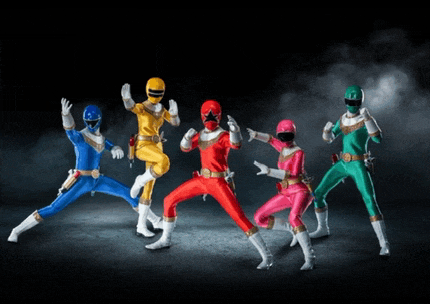 a group of power rangers are posing for a picture together