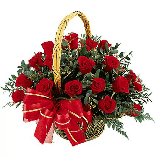 a basket full of red roses with a red bow