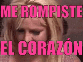 a woman in a pink shirt with the words me rompiste el corazon above her